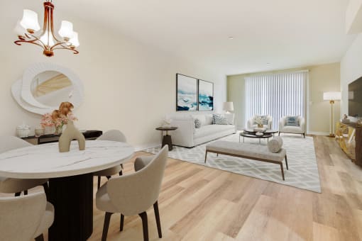 a living room and dining room with a table and chairs