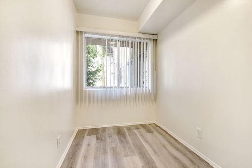 Dining area with wood inspired floors