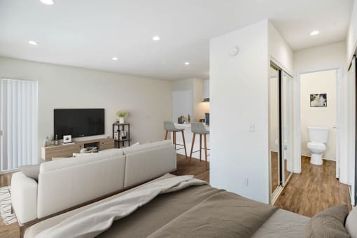 a living room with a couch and a tv