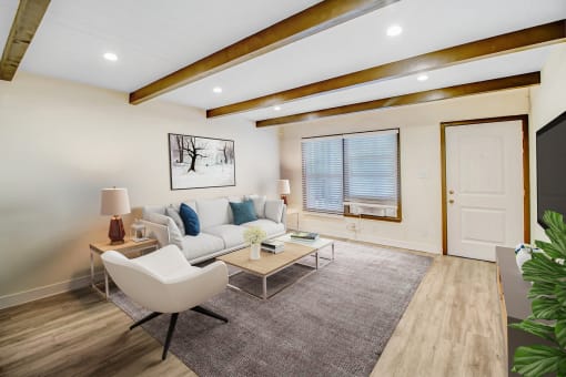 a living room with a couch and a coffee table