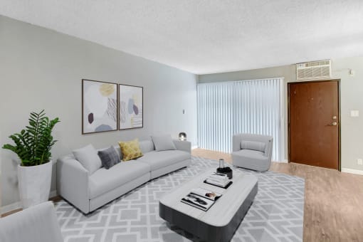 a living room with couches and a coffee table