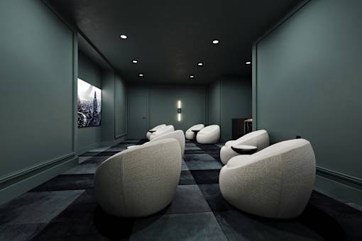 Theater room with comfortable seating and large screen