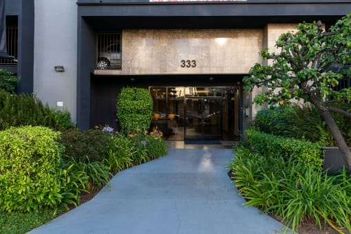 a view of the front of the building from the sidewalk