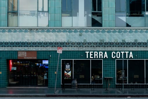 a store front with a sign that reads terra cotta