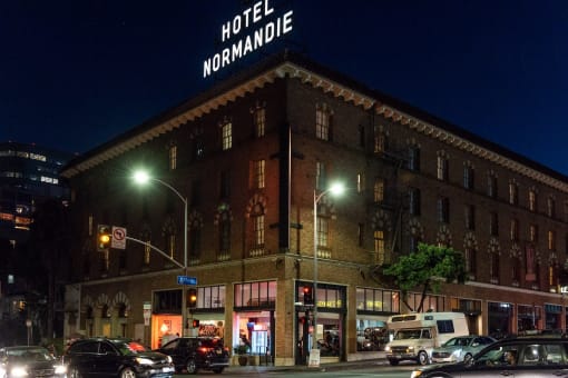 a night view of the hotel normandie