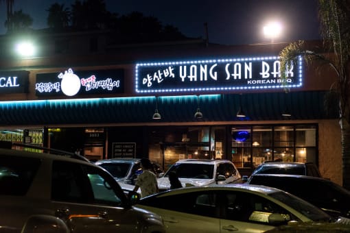 the front of the restaurant at night