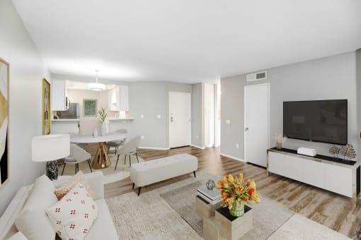 a living room with a couch and a tv