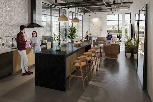 Common area with full kitchen, big screen TV and work from home space at Skylar At Sunset, Los Angeles California 