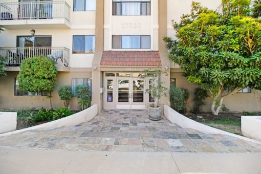 the front entrance to the building of the encinitas condominiums