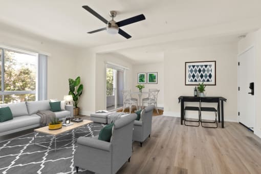 a living room with couches chairs and a coffee table
