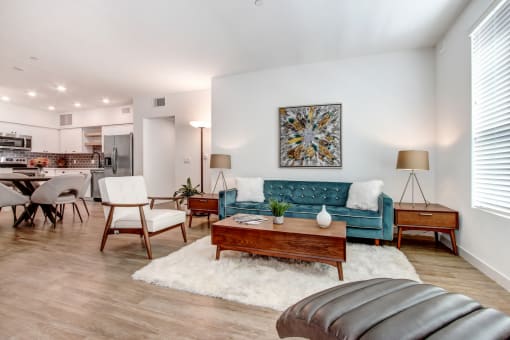 Open floorplan with wood-inspired floors throughout