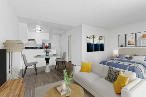 a living room with a couch and a table and a bed
