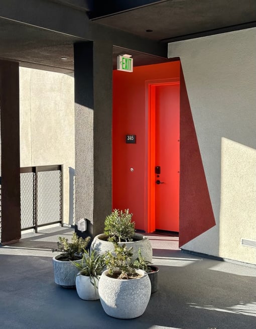 a red door at the entrance of a building