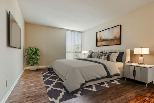a bedroom with a bed and a window