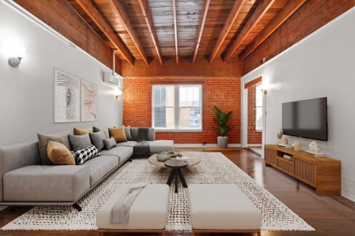 a living room with a couch and a tv