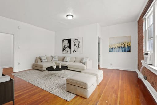 a living room with two couches and a coffee table