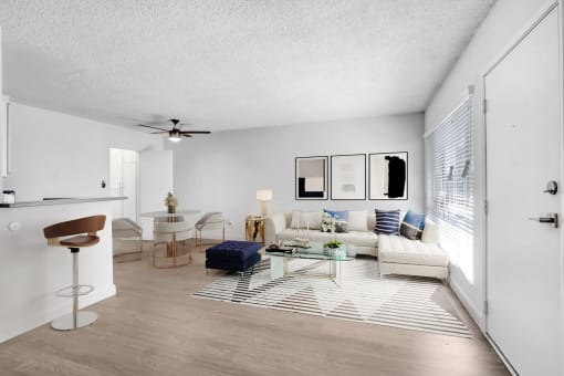 a living room with a couch and a table