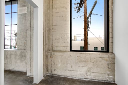 a large window in the corner of a room