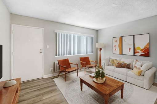 the preserve at ballantyne commons living room with white couches and chairs