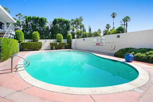 the swimming pool at the villa apartments