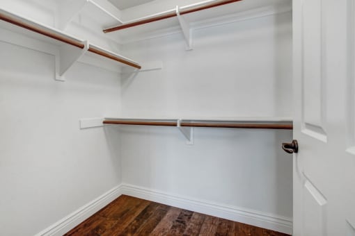 a walk in closet in a 555 waverly unit
