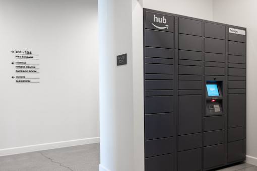 A tall black locker with a small screen on the front at Skylar At Sunset Apartments, California