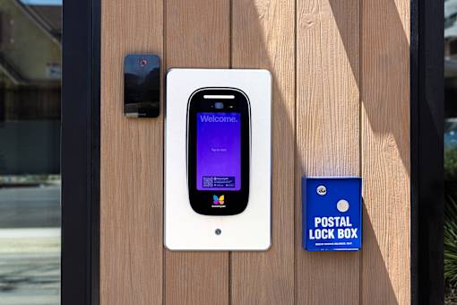 A phone is plugged into a post box at Skylar At Sunset Apartments, California