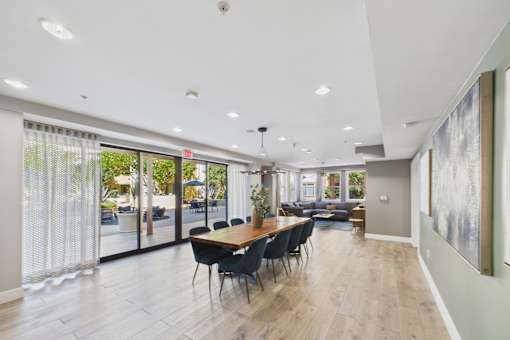 A dining room with a table and chairs is shown.