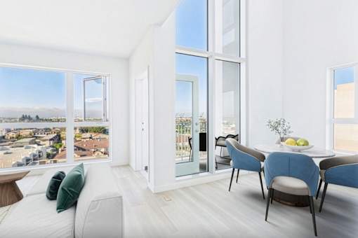 A modern living room with a view of the city.