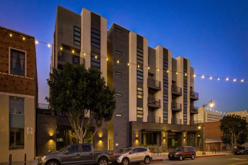 the building where the hotel is located is lit up at night