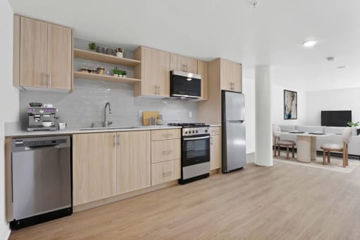 a kitchen with wooden cabinets and stainless steel appliances