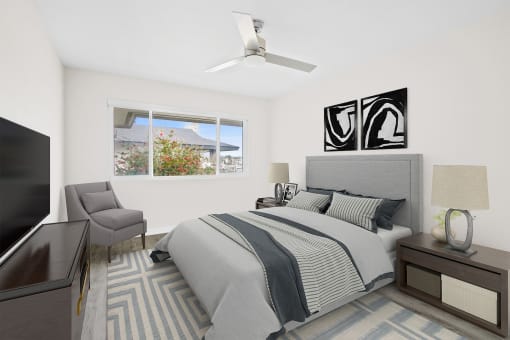 a bedroom with white walls and a large window