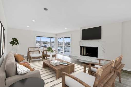 a living room with a fireplace and a large window