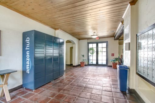 a room with a lockers and a bench