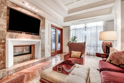 a living room with a couch and a fireplace
