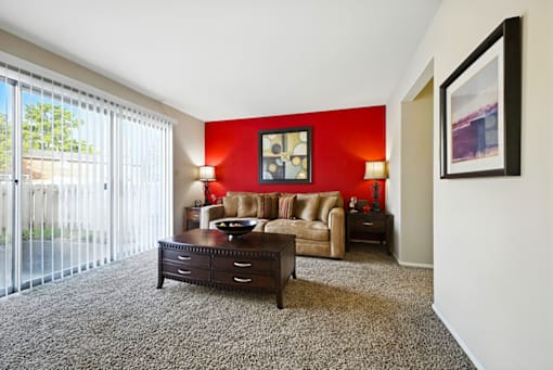 Living room of a 2-bedroom apartment at Ashton Pointe Apartments.