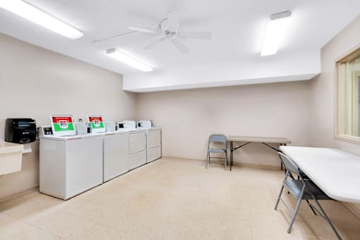 Laundry facility at Fairington of Louisville.