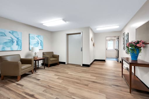 Social lobby at Fairington of Louisville featuring cozy seating.
