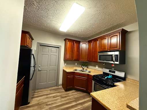 Clubhouse Kitchen with Stainless Steel Appliances at Ashmore Trace