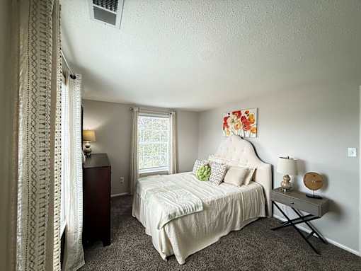Spacious Bedroom with a Window in a One Bedroom Apartment at Ashmore Trace