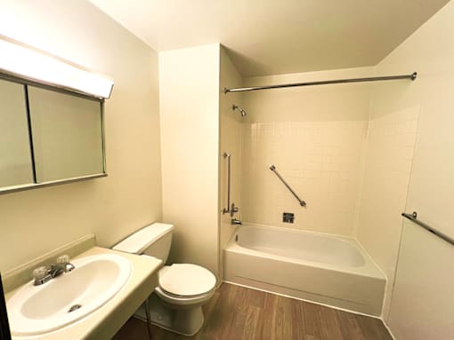 Bathroom in a one-bedroom, one-bathroom apartment at Kentwood Square Apartments.