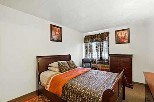 Bedroom in a one-bedroom apartment at Hammond Elderly Apartments.