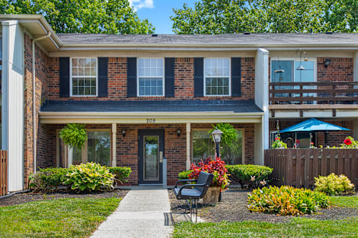Exterior view of Fairington Apartments in Lafayette, highlighting the architectural design, windows, and balconies.
