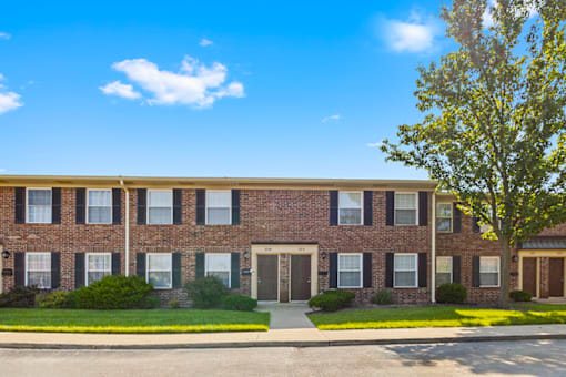 Exterior view of a building at Richfield Apartments West Lafayette, showcasing well-maintained landscaping.