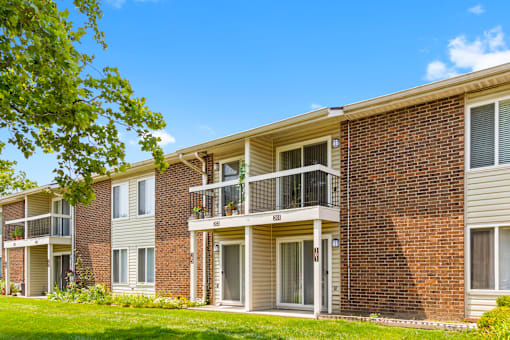 Café-style balcony and patio at Greenbriar Apartments.