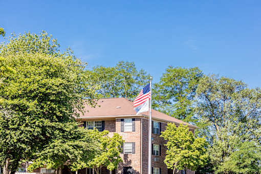 A house with an American flag on the roof.