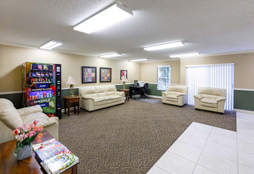 Clubhouse at Cambridge Square Apartments in Lauderdale Lakes, offering a comfortable space for residents to relax and socialize.