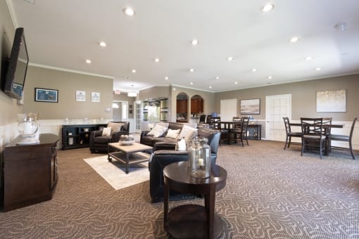 Clubhouse interior with ample seating at Archer's Pointe.