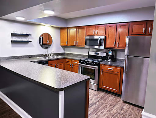 Clubhouse kitchen at Woodbridge Apartments Bloomington.