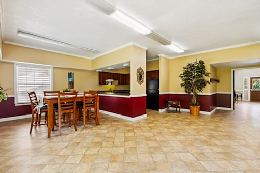 Community dining room and kitchen at Carriage House Apartments, Muncie, IN